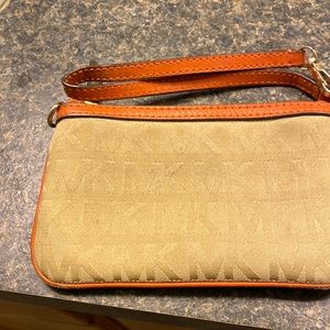 Am selling a Michael kors wallet. Used, but in good condition